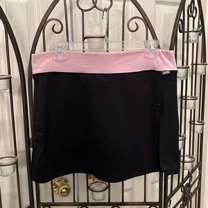 Black skort with pink shorts and waistband